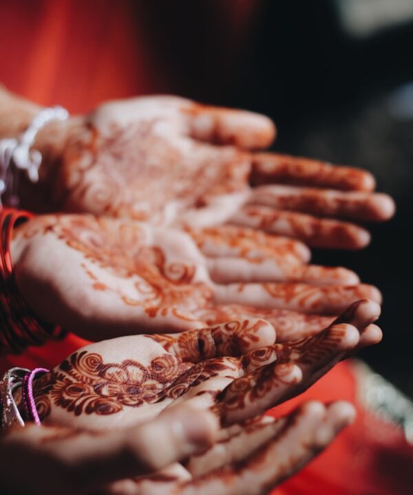 women with mendhi tattoos